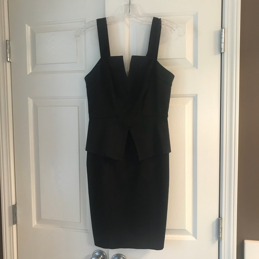 Black peplum cocktail dress